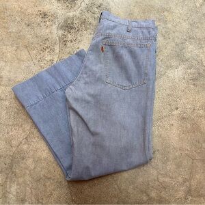 Vintage 1970s Distressed Orange Tab Levi Light Wash Flared Jeans / 32-33” Waist
